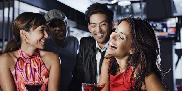 Friends drinking in nightclub