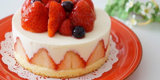 Strawberry cake on a plate.