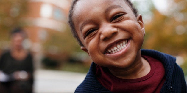 Close up of smiling face of African American boy