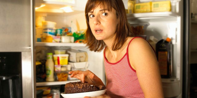 Woman eating cake