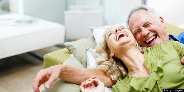 Couple laying on sofa together