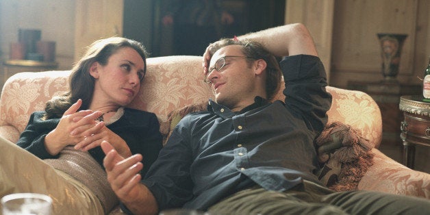 Couple relaxing on sofa