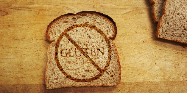 Slice of bread with Gluten text - Gluten Free diet concept