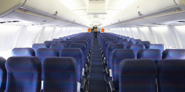 Rows of empty seats on airplane