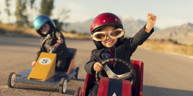 This young businessman is using his competitive skills to race to the front of the pack. Winning.