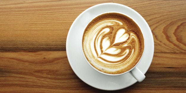 cup of coffee on a wood counter