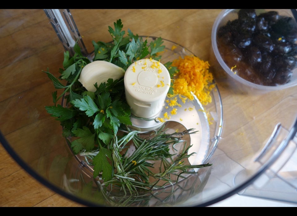 Making the aromatic olive paste for smearing the lamb