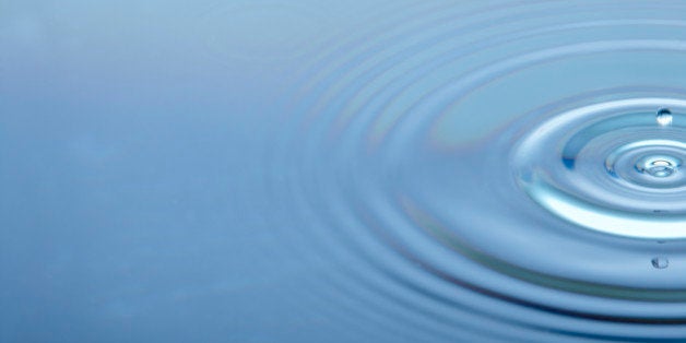 Concentric Circles Forming In Still Water