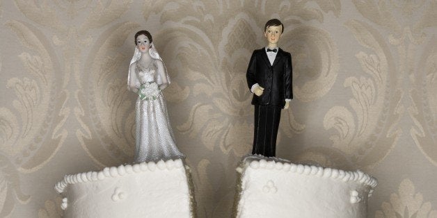 Wedding cake visual metaphor with figurine cake toppers