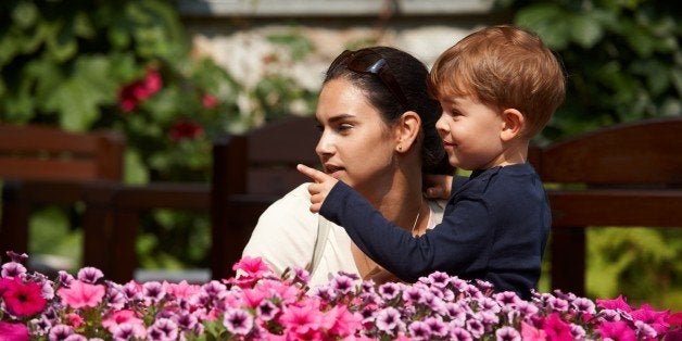 Child explaining to mother outdoor