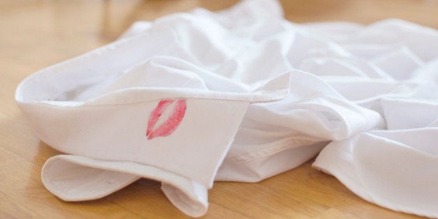 Lipstick mark in shirt.