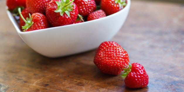 Heart shaped bowl of strawberries