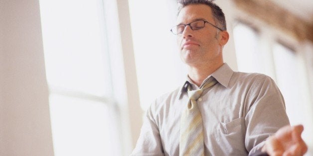 Businessman in Yoga Position