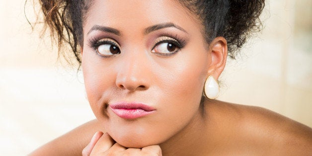 Closeup portrait of beautiful exotic emotional bride looking impatient