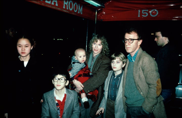 Soon Yi Previn, seen far left. Actress Mia Farrow is holding her daughter, Dylan Farrow.