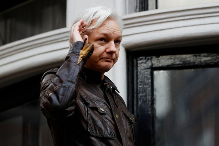 WikiLeaks founder Julian Assange is seen on the balcony of the Ecuadorian Embassy in London in May of last year.