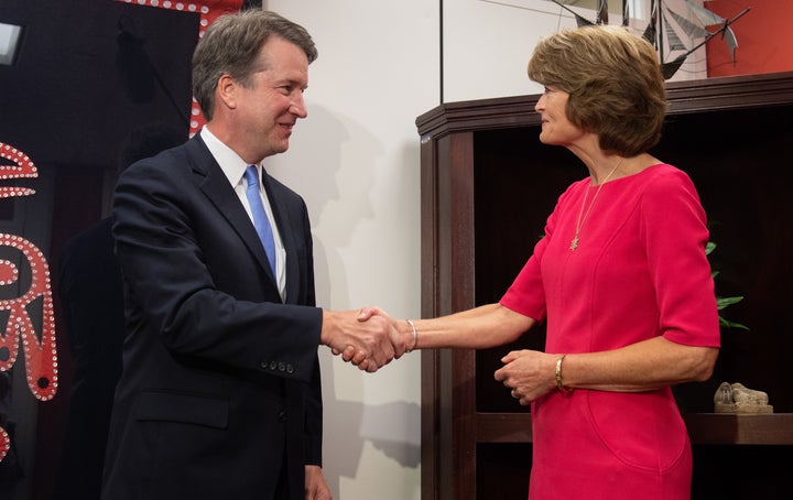 Supreme Court nominee Brett Kavanaugh and Sen. Lisa Murkowski (R-Alaska) meet on Aug. 23 on Capitol Hill.