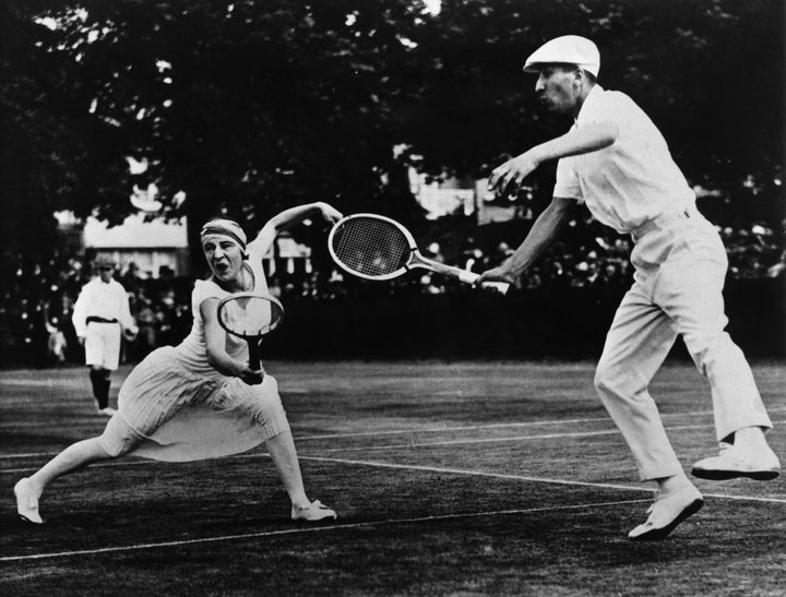 Suzanne Lenglen and René Lacoste play mixed doubles in the 1920s.