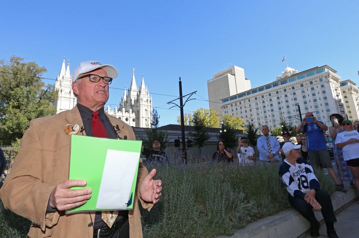 Sam Young, a former Mormon bishop, talks to supporters across the street from the world headquarters of the Church of Jesus Christ of Latter-Day Saints on Sept. 16, 2018, in Salt Lake City, Utah.