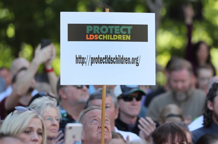 Supporters rally for Sam Young as he reads a letter stating he has been excommunicated from the Church of Jesus Christ of Latter-Day Saints.