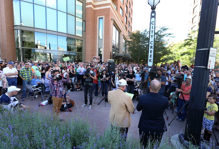 Sam Young, former Mormon bishop, talks to supporters in Salt Lake City, Utah, on Sunday.