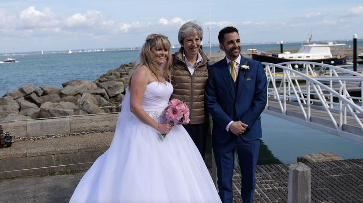 Michelle and Jason Dight with Theresa May on their wedding day