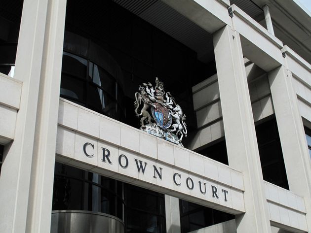 Exterior of Kingston Crown Court where the parents of an 18-year-old stand accused of controlling or coercive behaviour and one count of making a threat to kill (file photo).