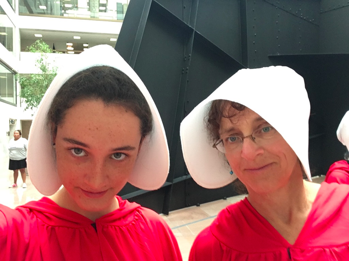 Margot Block (left) and Nadine Bloch (right), dressed as Handmaids.