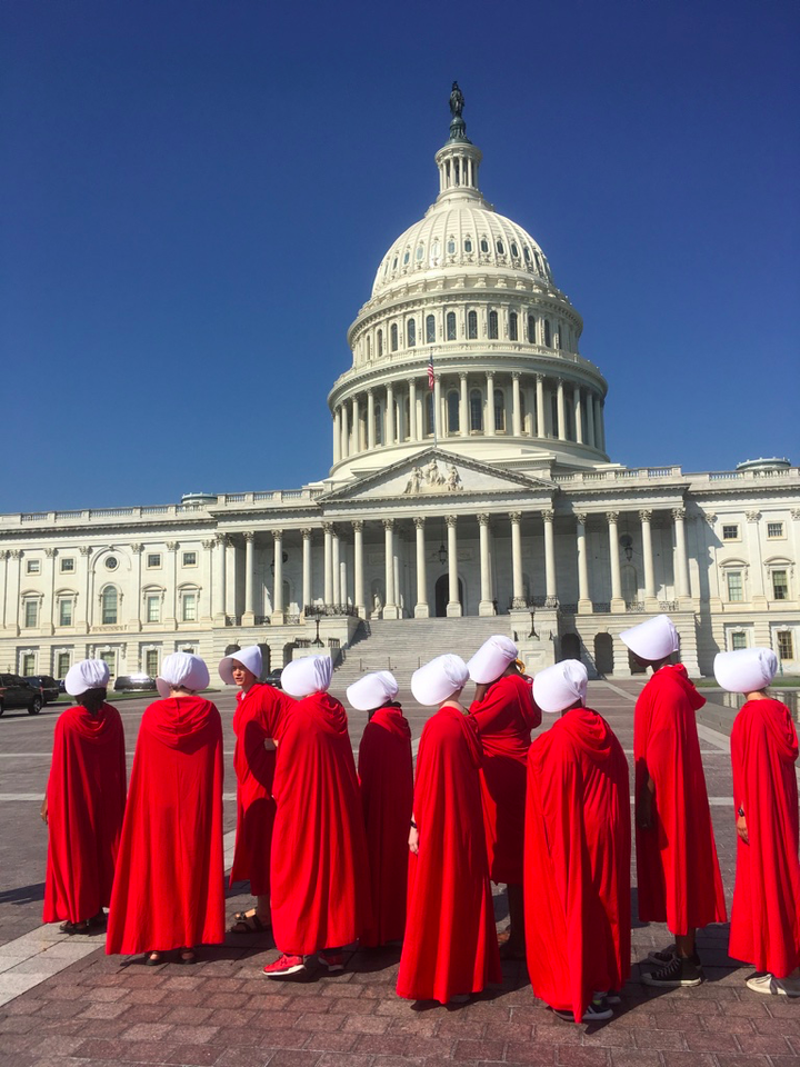 Nadine and Margot Bloch and other women dressed as Handmaids on Capitol Hill on Sept. 4, 2018.