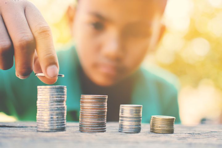 It's important to teach kids the concept of money early on. Here's how to do it.