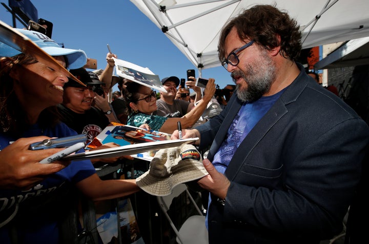 Jack Black signed autographs for fans.