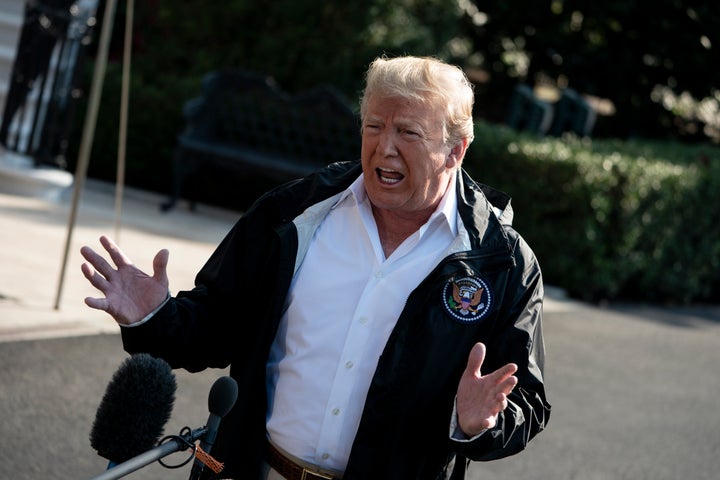 President Donald Trump speaks to the press before boarding Marine One on the South Lawn of the White House on Wednesday.