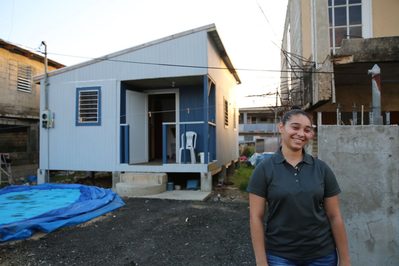 A year later, Acevedo is chipper as she talks about her new home. Built by a nonprofit organization, the house sits next door to her grandmother's now-rehabilitated home.
