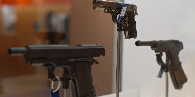 LONDON, ENGLAND - OCTOBER 07: A collection of pistols on display at the 'Met Crime Museum Uncovered' exhibition on October 7