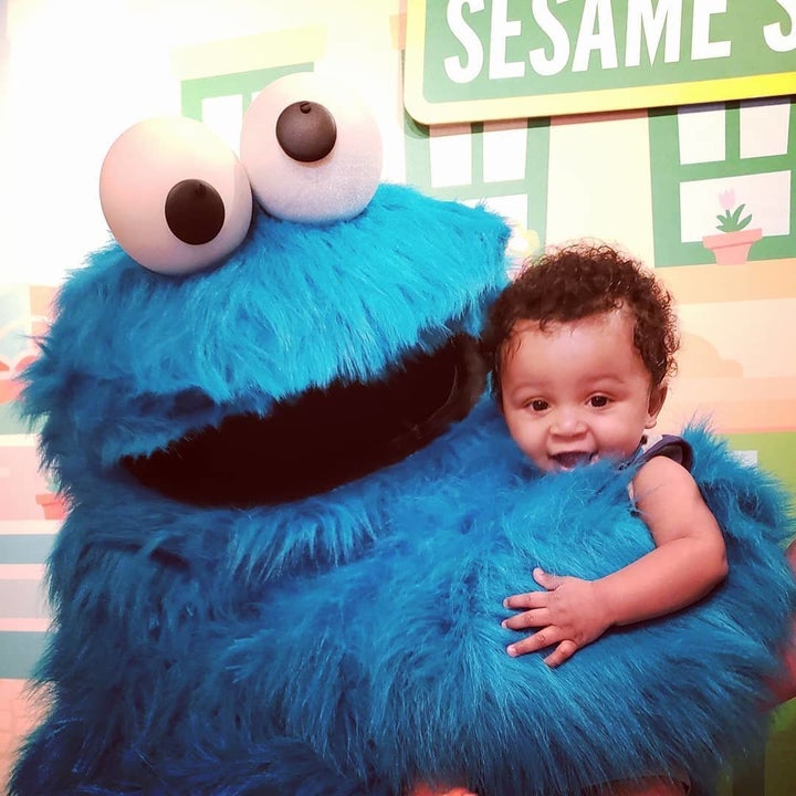 Malcolm with Cookie Monster.