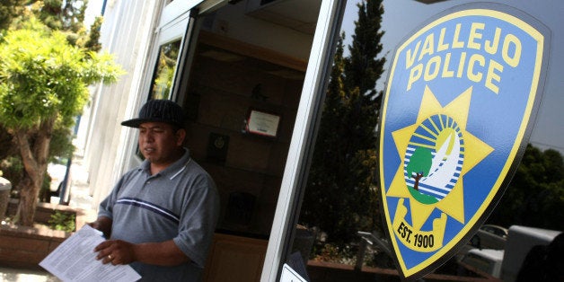 VALLEJO, CA - MAY 07: A man walks out of the Vallejo Police department May 7, 2008 in Vallejo, California. The Vallejo, California City Council voted overwhelmingly on Tuesday night for the city to file for Chapter 9 bankruptcy protection as the city of 117,000 struggles with a $16 million shortfall and no reserve funds for the fiscal year that begins on July 1st. The city's budget woes are being blamed in part by the ailing housing market and inflated public service employee wages. (Photo by Justin Sullivan/Getty Images)