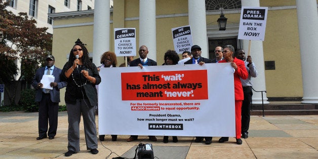 WASHINGTON, DC - OCTOBER 26: Tamisha Walker, Co-Founder, The Safe Return Project is interviewed after a press conference for coalition's Ban The Box Petition Delivery to The White House on October 26, 2015 in Washington, DC. (Photo by Larry French/Getty Images for ColorOfChange.org)