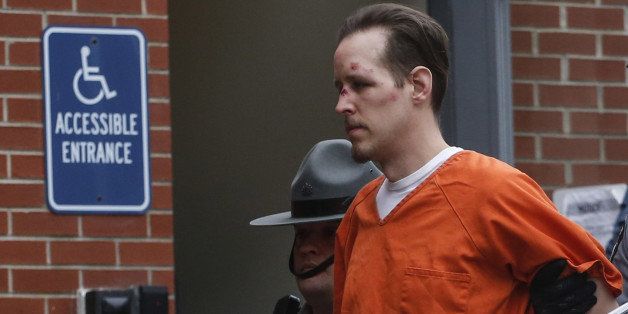 MILFORD, PA - OCTOBER 31: Eric Frein arrives for arraignment to court on October 31, 2014 in Milford, Pennsylvania. Frein, a suspected cop killer, was taken into custody from a Pennsylvania airport hangar after a seven-week manhunt. (Photo by Kena Betancur/Getty Images)