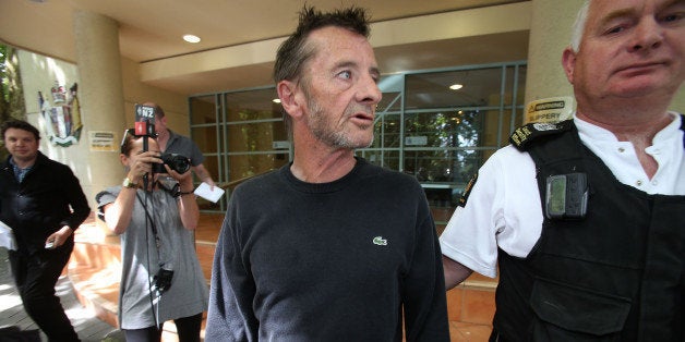 TAURANGA, NEW ZEALAND - DECEMBER 04: AC/DC drummer Phil Rudd leaves Tauranga District Court after being arrested in relation