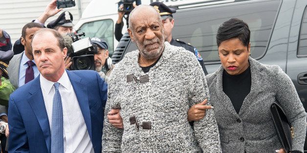 ELKINS PARK, PA - DECEMBER 30: Comedian Bill Cosby (C) arrives on December 30, 2015 at the District Court in Elkins Park, Pennsylvania. Cosby has been charged for aggravated indecent assault for a 2004 incident involving Temple University employee Andrea Constand. (Photo by Gilbert Carrasquillo/WireImage)