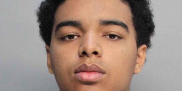 In this April 17, 2015 photo made available by the Miami Dade Department of Corrections shows Marc Wabafiyebazu, 15, under ar