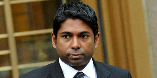 Rengan Rajaratnam, founder of Sedna Capital Management LLC and younger brother of imprisoned hedge-fund founder Raj Rajaratnam, exits federal court in New York, U.S., on Thursday, Nov. 21, 2013. Rengan Rajaratnam was charged in March by federal prosecutors in Manhattan accused of conspiring with his brother to trade on material nonpublic information about Clearwire Corp. and Advanced Micro Devices Inc. in 2008. Photographer: Louis Lanzano/Bloomberg via Getty Images 