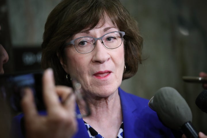 Sen. Susan Collins (R-Maine) answers questions from reporters on Monday about an allegation against Supreme Court nominee Brett Kavanaugh. 