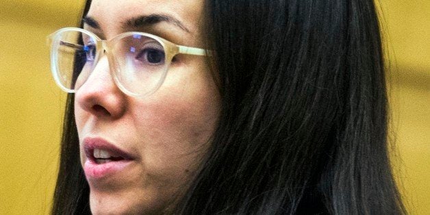Jodi Arias looks at her attorney in Maricopa County Superior Court in Phoenix, Friday, Nov. 21, 2014, during the sentencing p