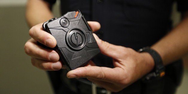 LOS ANGELES, CA - AUGUST 31: Los Angeles Police Department Officer Jim Stover demonstrates the use of a body camera during a training session at Mission Station on August 31, 2015 in Los Angeles, California. Over 7,000 officers will be outfitted with the cameras in the coming months, with the first round rolling out today. (Photo by Al Seib/Los Angeles Times via Getty Images)