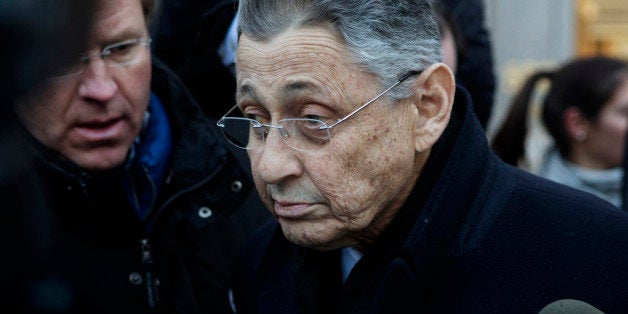 Sheldon Silver, New York state assembly speaker, is surrounded by members of the media while exiting federal court in New Yor