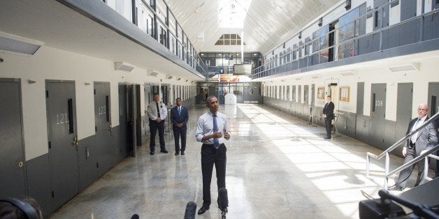 US President Barack Obama speaks as he tours the El Reno Federal Correctional Institution in El Reno, Oklahoma, July 16, 2015. Obama is the first sitting US President to visit a federal prison, in a push to reform one of the most expensive and crowded prison systems in the world. AFP PHOTO / SAUL LOEB (Photo credit should read SAUL LOEB/AFP/Getty Images)