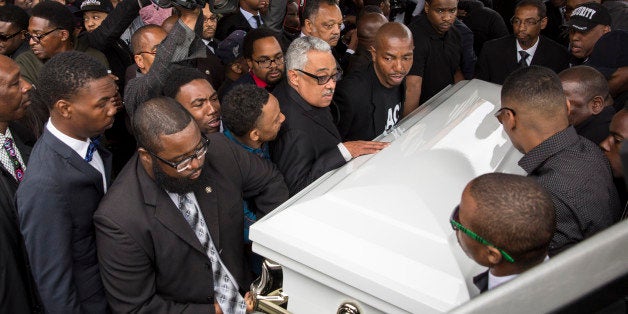 BALTIMORE, MD - APRIL 27: Pallbearers carry the casket of Freddie Gray to the hearse after his funeral service at New Shiloh Baptist April 27, 2015 in Baltimore, Maryland. Gray, 25, was arrested for possessing a switch blade knife April 12 outside the Gilmor Homes housing project on Baltimore's west side. According to his attorney, Gray died a week later in the hospital from a severe spinal cord injury he received while in police custody. (Drew Angerer/Getty Images)