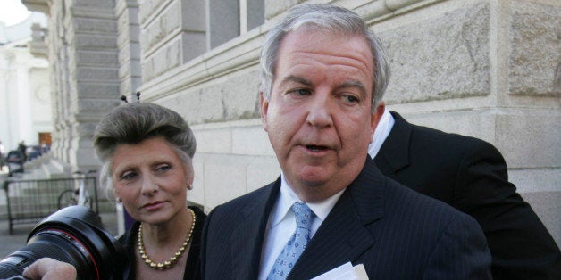 Andy Savage and his wife Cheryl talks to reporters after a detention hearing for his client Ali al-Marri an alleged al-Qaieda sleeper agent Wednesday, March 18, 2009, in Charleston, S.C. U.S. Magistrate Judge Robert Carr turned down Ali al-Marri's bid to be released on bond, Wednesday despite an offer by his lawyer's wife to put up collateral to guarantee al-Marri wouldn't flee before his trial in Illinois on terror charges. (AP Photo/Mary Ann Chastain)