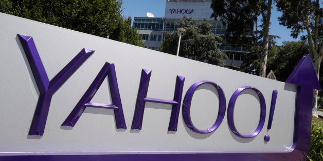 A Yahoo sign is seen at the company's headquarters Tuesday, July 19, 2016, in Sunnyvale, Calif. (AP Photo/Marcio Jose Sanchez)